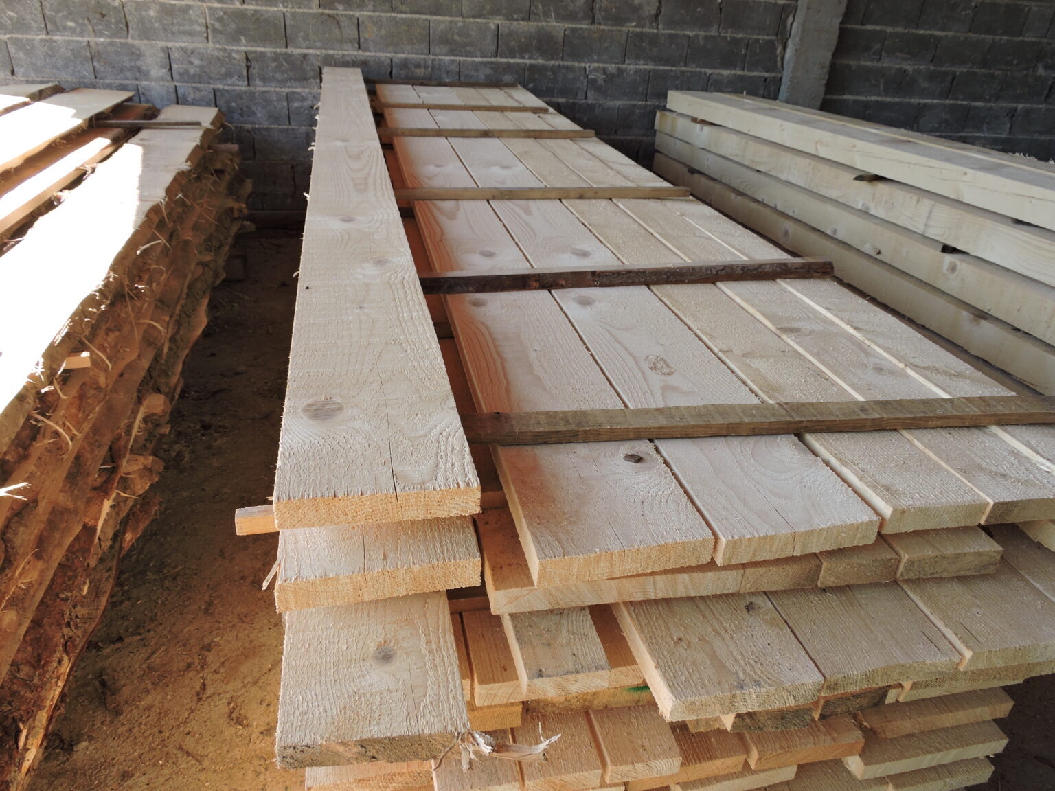 Wood strip flooring and wall cladding
